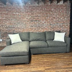 Gray Crate and Barrel Sectional With Pullout Bed