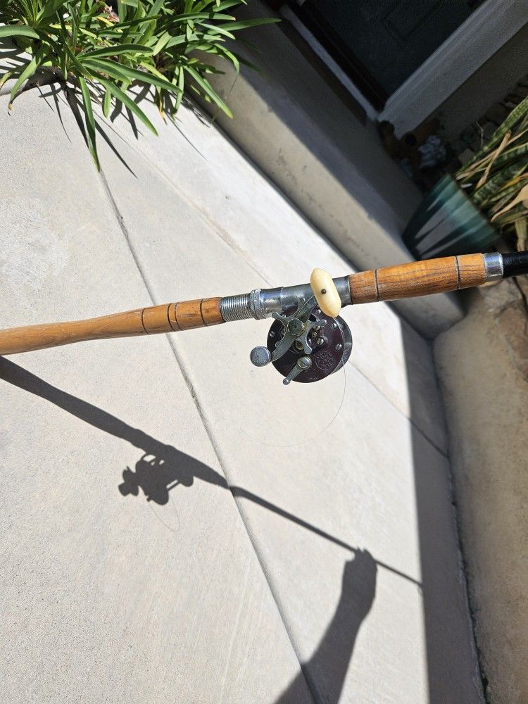 Penn Fish Reel On A Penguin Rod + 3 Rods