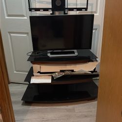 Tv Stand With Smart Tv And Speaker