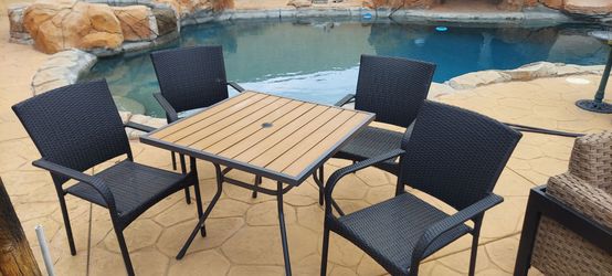 5 Piece Patio Dining Set with stackable chairs $175