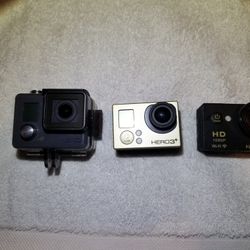 3 Go Pro Cameras and Accessories/Batteries and Chargers 