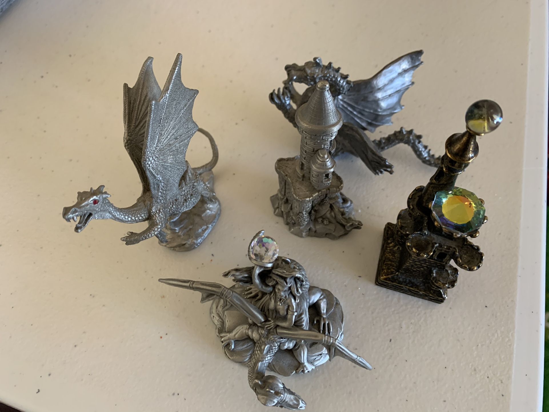 5 Pewter Figurines castles and dragons for 10.00