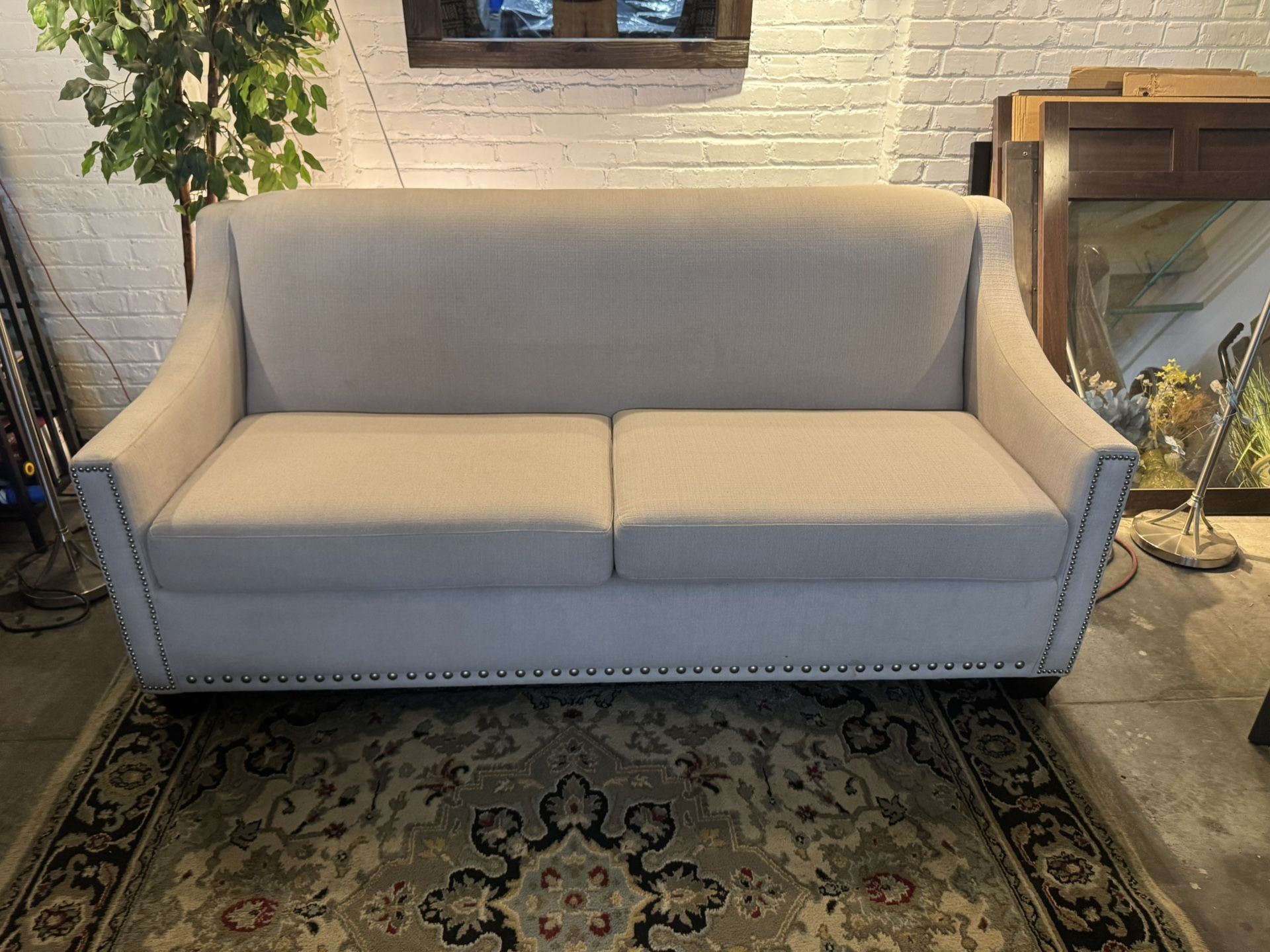 Sofa with Sloped Arms & Nickel Tufting Buttons