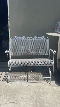 White swing wrought iron