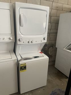 GE UNITIZED SPACEMAKER® 3.8 CU. FT. CAPACITY WASHER WITH STAINLESS STEEL BASKET AND 5.9 CU. FT. CAPACITY ELECTRIC DRYER