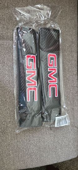 2 GMC seatbelt shoulder pads