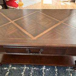 Solid Wood Coffee Table with A Drawer From Ashley Furniture ($350 Value) 