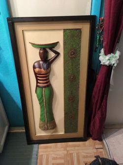 Indonesian wooden 3-D shadowbox wall hanging depicting a woman carrying bowl over head, Pier 1 Imports