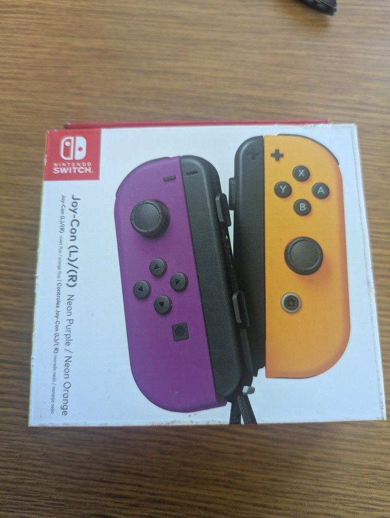 Nintendo Switch Joycons (Yellow & Purple)