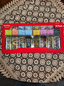 Prismatic Evolution Costco Mini Tin 8 Pack