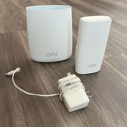 NETGEAR Orbi Compact Wall-Plug Whole Home Mesh WiFi System. Router and wall plug satellite extender.