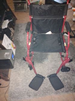 Band new in box ,transport wheelchair