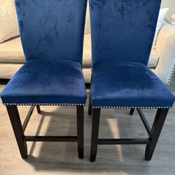 4 Studded Trim and Counter Height Chairs