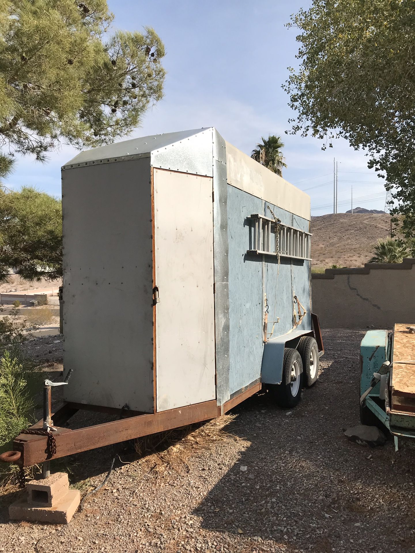 Enclosed trailer, 5’x8’x16’, 8 feet tall. Custom tool closet on front of trailer. Metal lockers inside trailer. Two heavy duty job boxes inside.