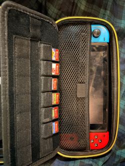 Nintendo switch with 6 games and case