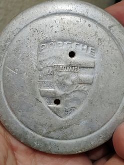 Vintage OEM Porsche 80mm Silver Aluminum Wheel Center Cap - 911 930 944Description:Genuine factory Porsche wheel center cap. This is the 80mm aluminum