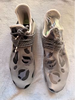adidas x Pharrell Williams NMD Human Race Animal Print sneakers in an "Ash" gray