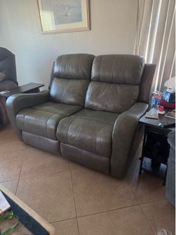 Loveseat, grayish green.