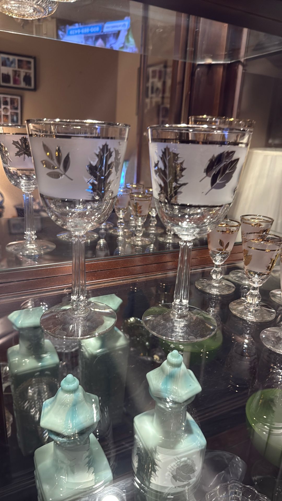 Two wine glasses, trimmed in silver