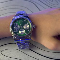 Green silver watch