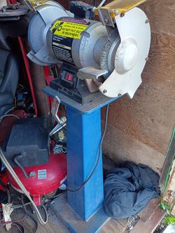Bench grinder with stand