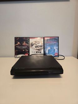 Refurbished Memorex DVD player with 3 horror movies