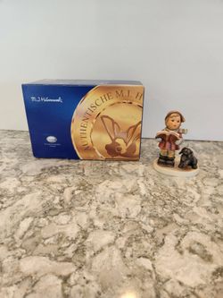 Hummel #2134 "Wintertime Duet" Girl Singing with Dog - 4"

In Original box