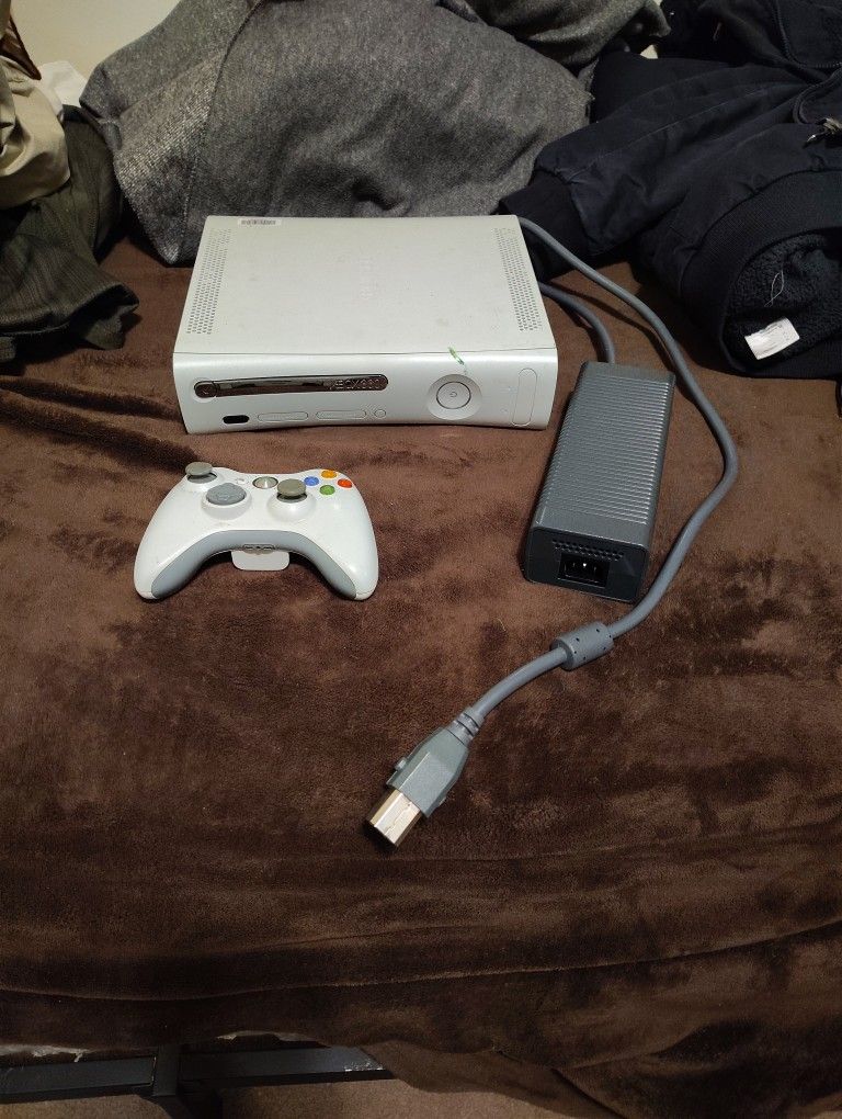 Xbox 360 Console, Controller, Part Of A Power Plug, And Harry Potter And The Order Of The Phoenix Game