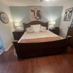 Seven piece bedroom set solid wood from Ashley furniture for sale