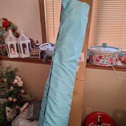 Patio, umbrella.
Turquoise in color