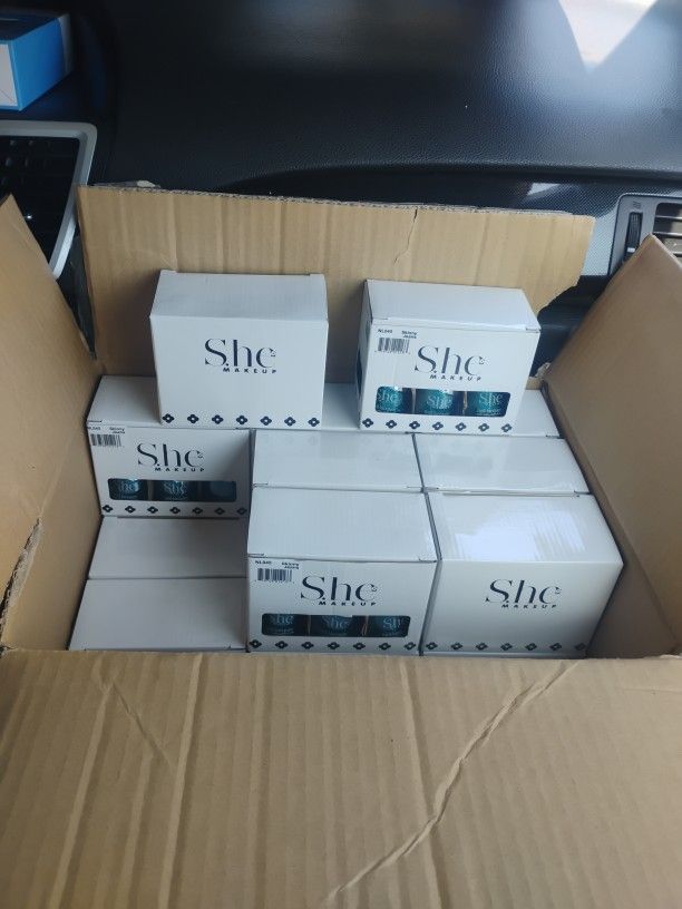 $20 for box each little white box has 6 nail polishes blue glitterish color