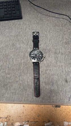 TW Steel Canteen (Model TW11) quartz chronograph watch with a 50mm stainless steel case, black dial, tachymeter bezel, and a black leather strap with 