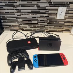 Nintendo Switch With Neon Blue And Red Joy-Con + Extra Controller 