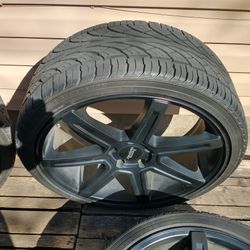 American Racing 22 Inch by 11.5 Wide All Black 7 Bars with Like New Tires With Really Good Tread