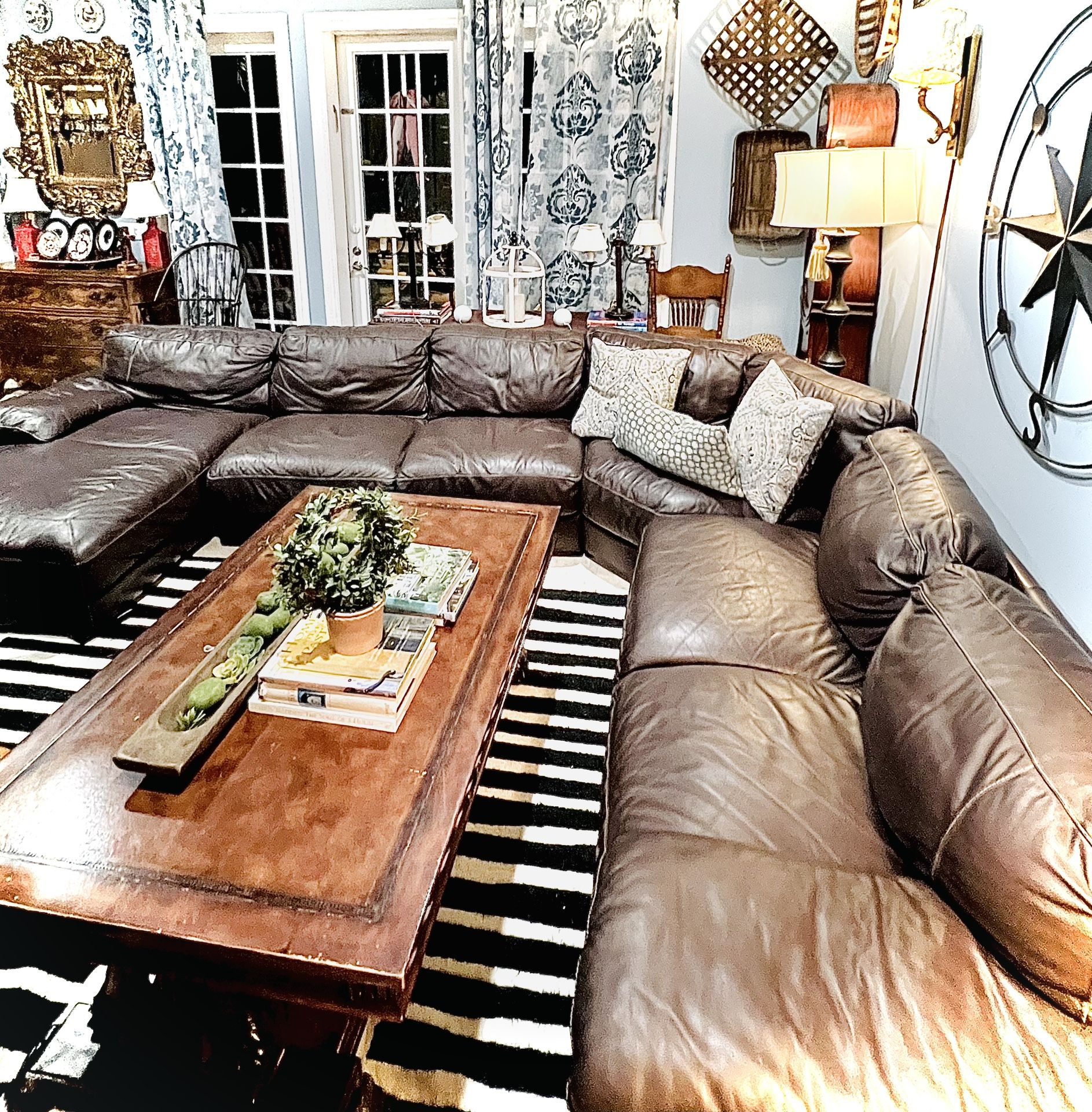 Cindy crawford leather sectional sale rooms to go