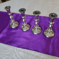 4 Silver metal candle holders