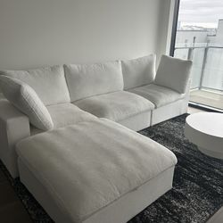 White Sectional & Area Rug