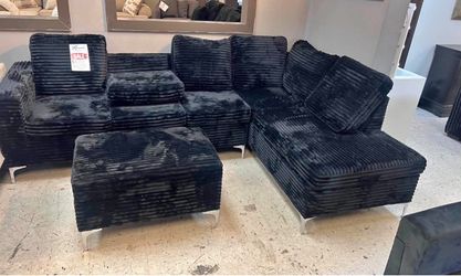 Brand new black sectional couch with ottoman