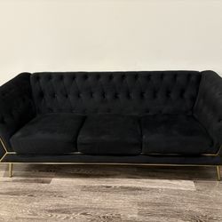 Black Couch With Gold Rim