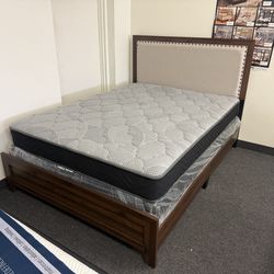 Queen bed frame in brown with beige fabric