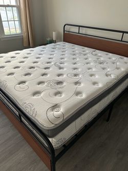 Moving Sale.  Brand New Cal King Size Bed & Mattress