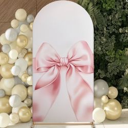 Arch Backdrop Made of Polyester drape with a Pink Elegant Ribbon Design