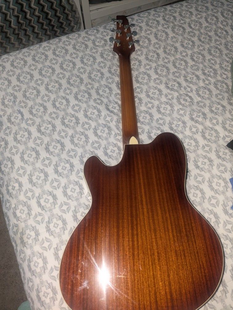 Half Acoustic, Half Electric Guitar