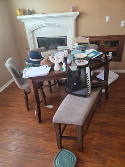 Dining table 3 chairs and a bench