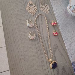 Jewelry necklace pendant earrings all together seats