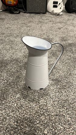 Decorative metal pitcher