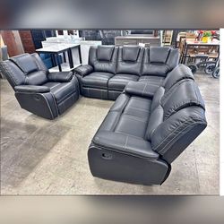 Black breathing leather manual reciliner sofa