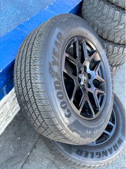 STOCK WHEELS AND TIRES. FORD F150   USED