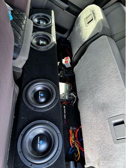 4 8” subwoofers, amplifier, bass processor