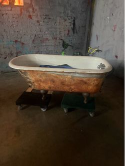 2 vintage cast iron clawfoot tubs